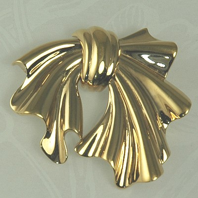 Golden Bow Pin Signed CAROLEE