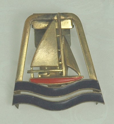 Older Enamel and Brass Clip with Sailboat Motif