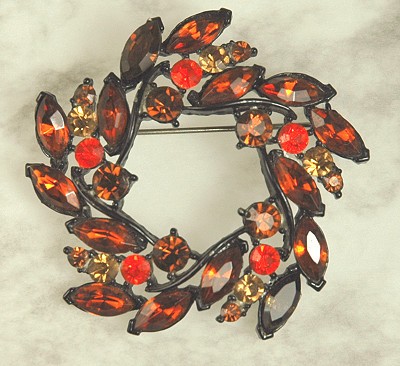 Striking Rhinestone Swirl Brooch