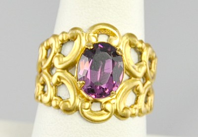 Attractive Open Metal Work Cuff Style Ring with Large Amethyst Rhinestone
