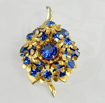 Lovely Unsigned Layered Blue Rhinestone Flowers on a Leaf Pin