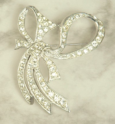 Captivating Rhodium Plated Rhinestone Bow Brooch Signed ORA