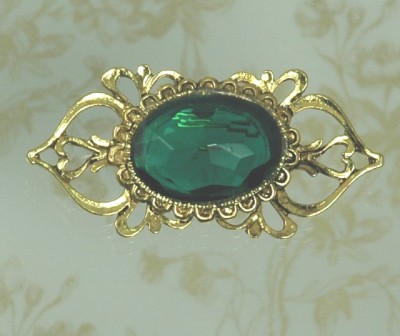 Unsigned Ornate Green Glass Brooch