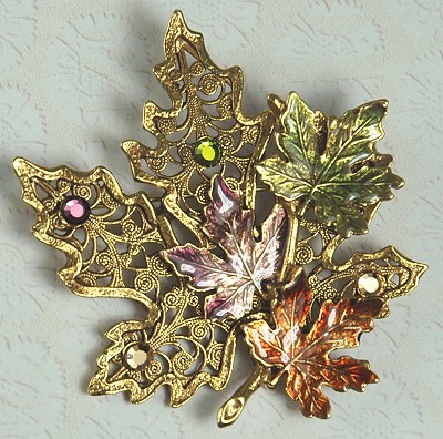 Lovely Rhinestone and Enamel Maple Leaf Brooch Signed KC