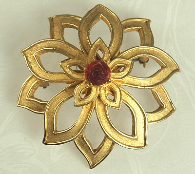 DeNICOLA Gold- tone Domed Floral Pin with Carved Red Glass