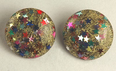 Amusing Mid- Century Plastic Confetti Sprocket Earrings with Embedded Stars
