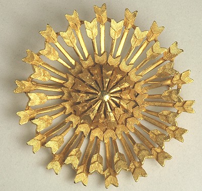 Large Brushed Gold- tone Arrow Tipped Ray Brooch