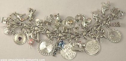 Eclectic and Loaded Vintage Sterling Silver Charm Bracelet