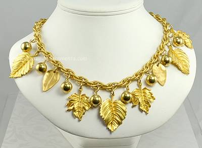 Daring Signed NAPIER Golden Leaves Charm Festoon Necklace