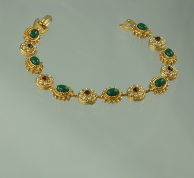 Outstanding Creation by ART.  An Elaborate Gold Tone Bracelet