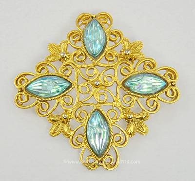 Exquisite Vintage Open Metal Work Brooch with Blue Ribbed Stones