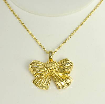 Precious Unsigned Golden Bow Pendant Necklace
