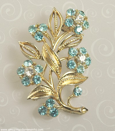 Pretty Blue and Clear Rhinestone Floral Spray Brooch Signed LISNER