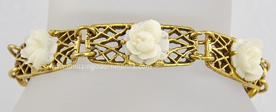 Picturesque Gold- tone Linked Panel Bracelet with Carved Roses Signed GOLDETTE