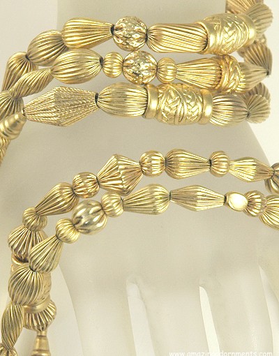 Opulent Golden Necklace and Triple Strand Bracelet Signed OSCAR de la RENTA