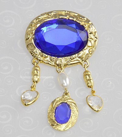 Fancy Brooch with Faceted Blue Stone and Dangles