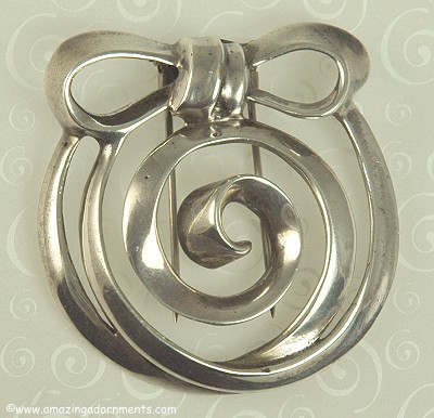 Vintage Sterling Swirling Circle Clip with Bow Signed NETTIE ROSENSTEIN