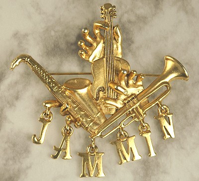Outrageous Swinging Brooch for New Years Eve or Mardi Gras