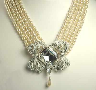 Unsigned and Lovely Five Strand Faux Pearl Necklace with Rhinestone Centerpiece and Clasp